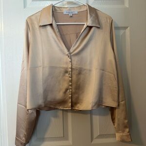 Women’s gold button down blouse